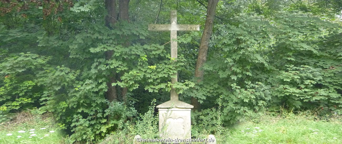 Wegekreuz in einem schlechten Erhaltungszustand.